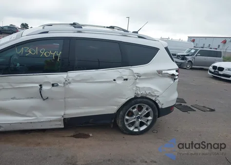 2014 Ford Escape Titanium from USA, damaged, VIN 1FMCU0J90EUA75548